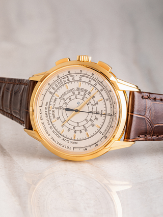 Sophisticated Patek Philippe timepiece showcasing a sleek black dial and stainless steel case.