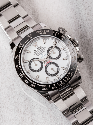 Rolex Oyster Perpetual Cosmograph Daytona steel 116500LN "Panda" dial watch featuring a tachymeter bezel with values from 60 to 400 "UNITS PER HOUR," a white dial with contrasting black subdials