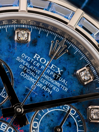 Diamond-set Rolex Daytona 116589SACI dial showcasing text details, complications, diamond markers, and watchmaking precision