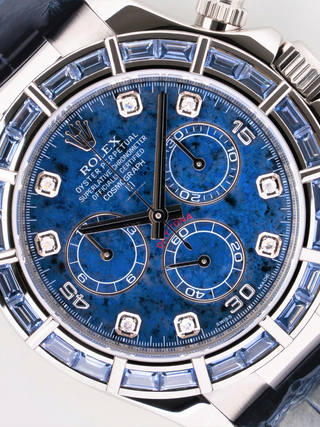 Luxury Rolex Daytona 116589SACI watch with diamond bezel, blue dial accents, visible branding, and complications