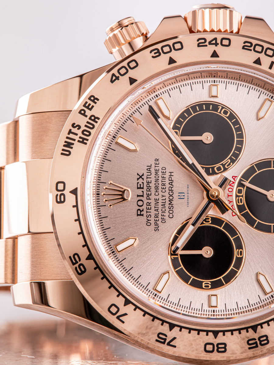Detailed view of a Rolex Daytona 126505, showcasing the rose gold case and bracelet, the black subdials with rose gold outlines