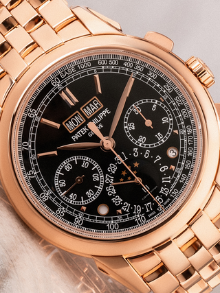 The dark black dial of Patek Philippe 5270/1R is displayed