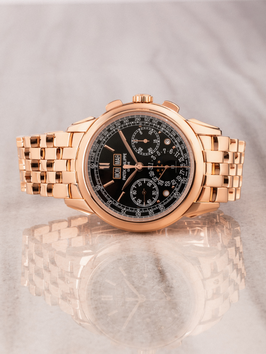 Patek Philippe 5270/1R placed horizontally on a marble floor