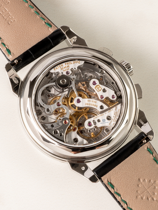 The picture is back portion of Patek Philippe 5270P watch, highlighting the Chronograph with straps