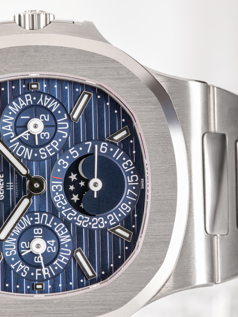 The semi visible dial of Patek Philippe 5740/1G with a moonphase indicator and a date display