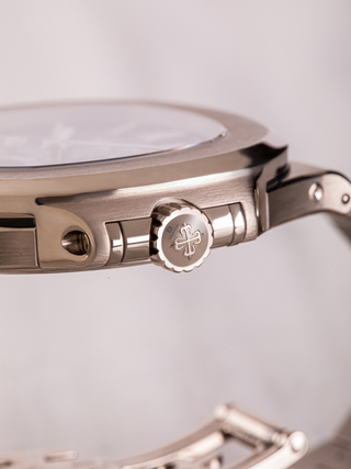 Patek Philippe 5740/1G placed in a manner that the crown is in focus