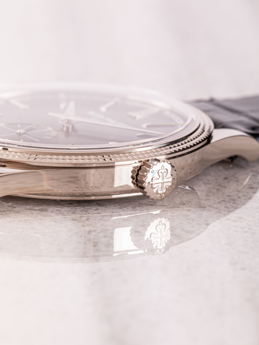 A detailed image of the crown of Patek Philippe 6119G