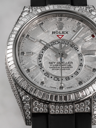 Rolex Sky-Dweller 326259TBR featuring numerical display on the dial, diamond hour markers, and a rotating bezel