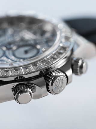 Close-up of Rolex Daytona 116589TBR with diamond bezel, crown and chronograph pushers