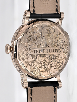 The picture focuses on designer crown of Patek Philippe 5160/500G watch