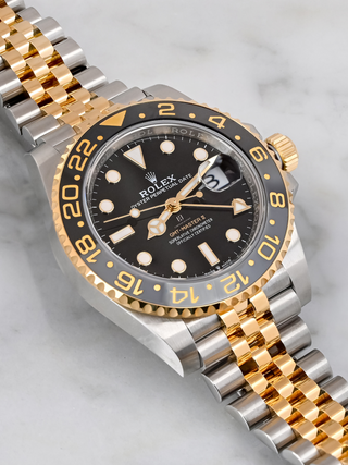 Rolex GMT-Master II 126713GRNR with two-tone bracelet and black dial