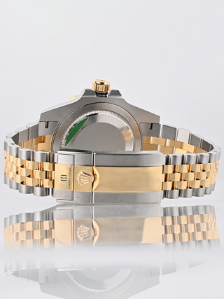 Close-up of the deployant clasp of Rolex GMT Master II 126713GRNR with the Rolex logo visible