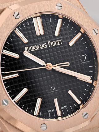The dark black dial of Audemars Piguet 15510OR with its rose gold bezel