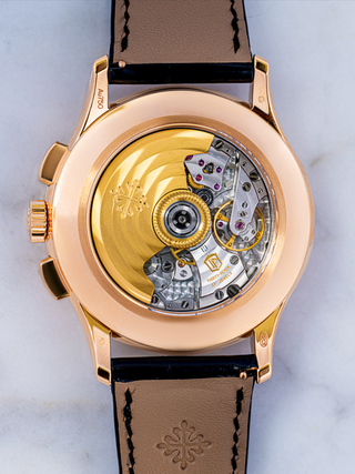 The image is the vertical view of Patek Philippe 5905R with its dial and straps