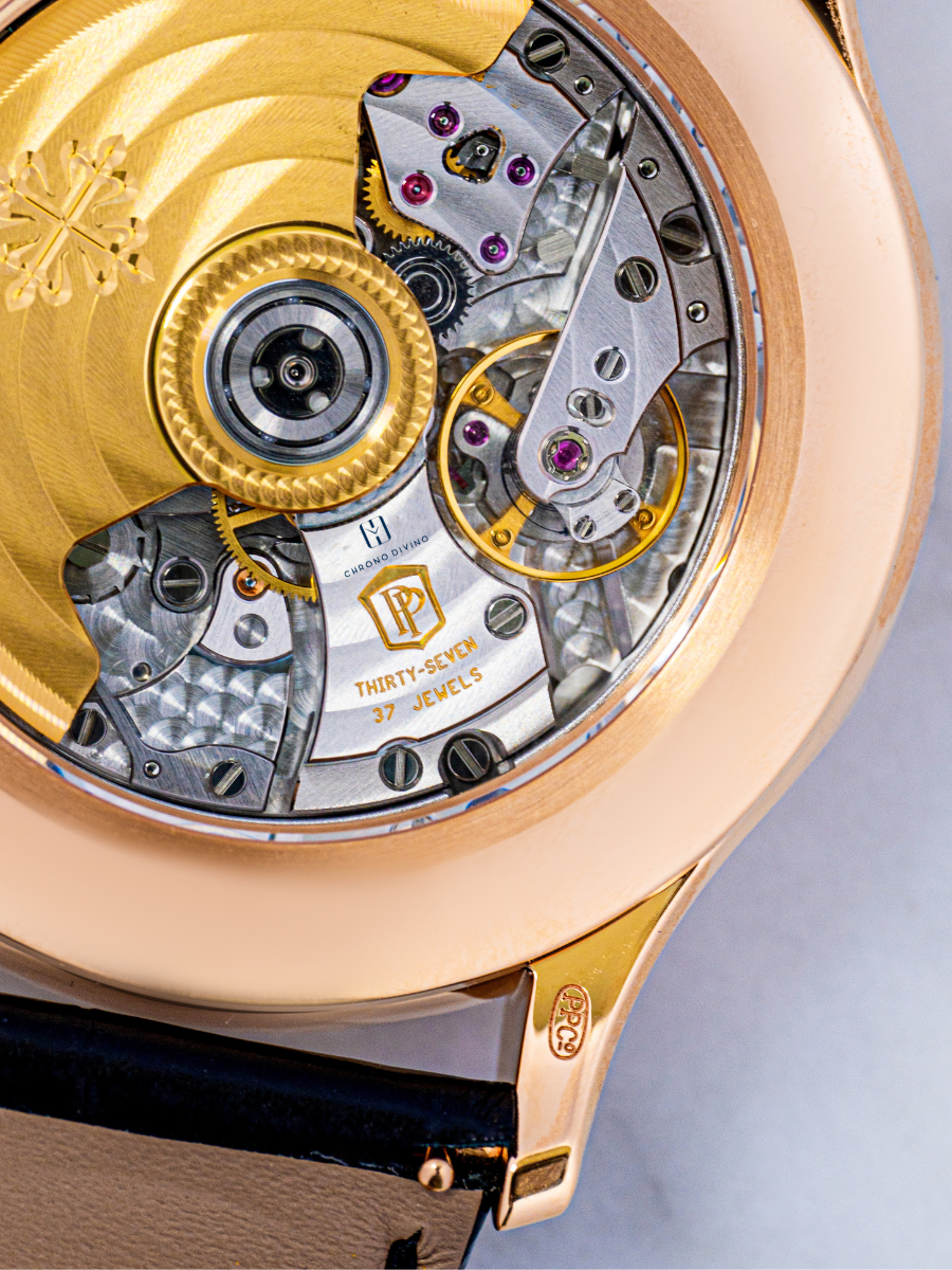 Patek Philippe watch is shown in the picture, highlighting 37 jewels and Chrono Divino logo embossing