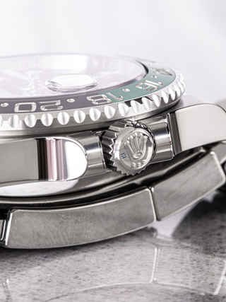 Rolex GMT Master II 126720VTNR watch showcasing the stainless steel bracelet, case back, and clasp with engraved the brand