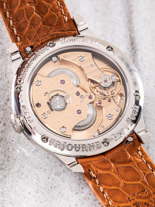 The case of F.P. Journe Chronometre Souverain with visible gears