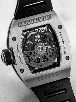 The case of Richard Mille RM 010 with the 'Swiss Made' and 'Water Resistant' engrave