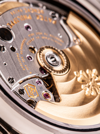 The picture represents the enlarged view of Patek Philippe 5205G dial with design details