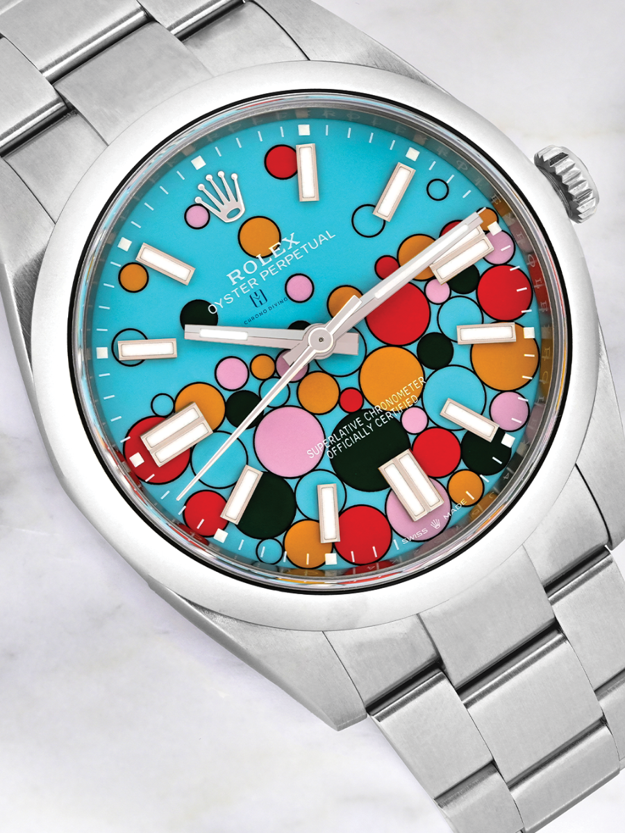 Stainless steel Rolex Oyster Perpetual 41 with "Celebration" dial, colorful bubbles design, smooth bezel, and oyster bracelet
