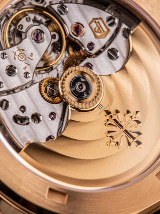 The back of Patek Philippe 5268/200R with revealing gears