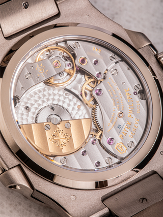 The back of Patek Philippe 5712G case with revealing gears