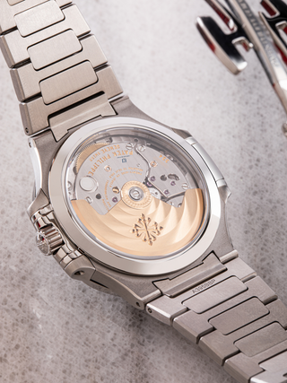 The back of Patek Philippe 7118/1A with visible gears