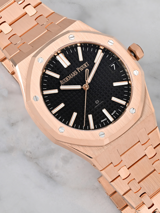 A rose gold Audemars Piguet 15510OR with a black dial