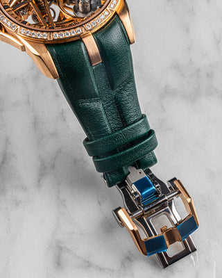 Roger Dubuis Excalibur in rose gold with diamonds, silver dial, and brown alligator strap – luxury timepiece designed with refined details.