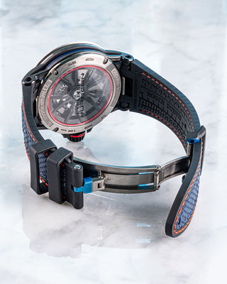 Roger Dubuis Excalibur Spider Huracán watch featuring openworked dial, hexagonal strut design, and black rubber strap – luxury meets motorsport.