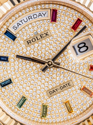 Close shot of Rolex Oyster Perpetual Day-Date with rainbow hour markers