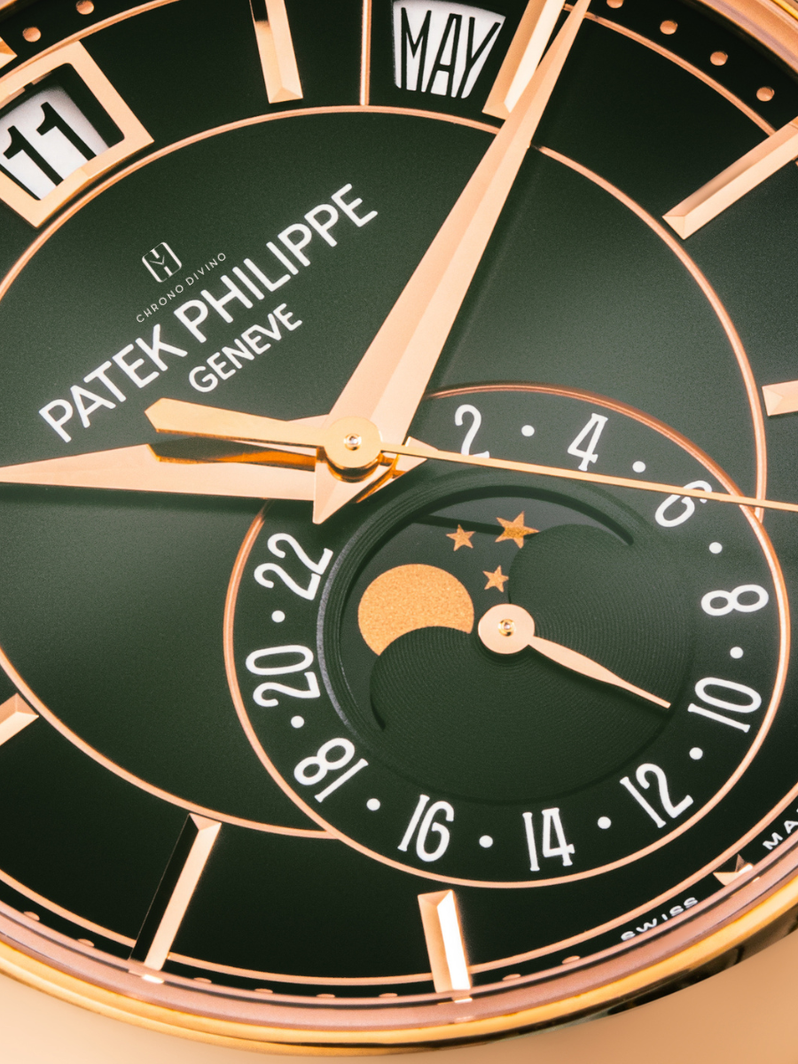 Elegant Patek Philippe watch featuring a silver dial, rose gold accents, and a luxurious brown leather strap.