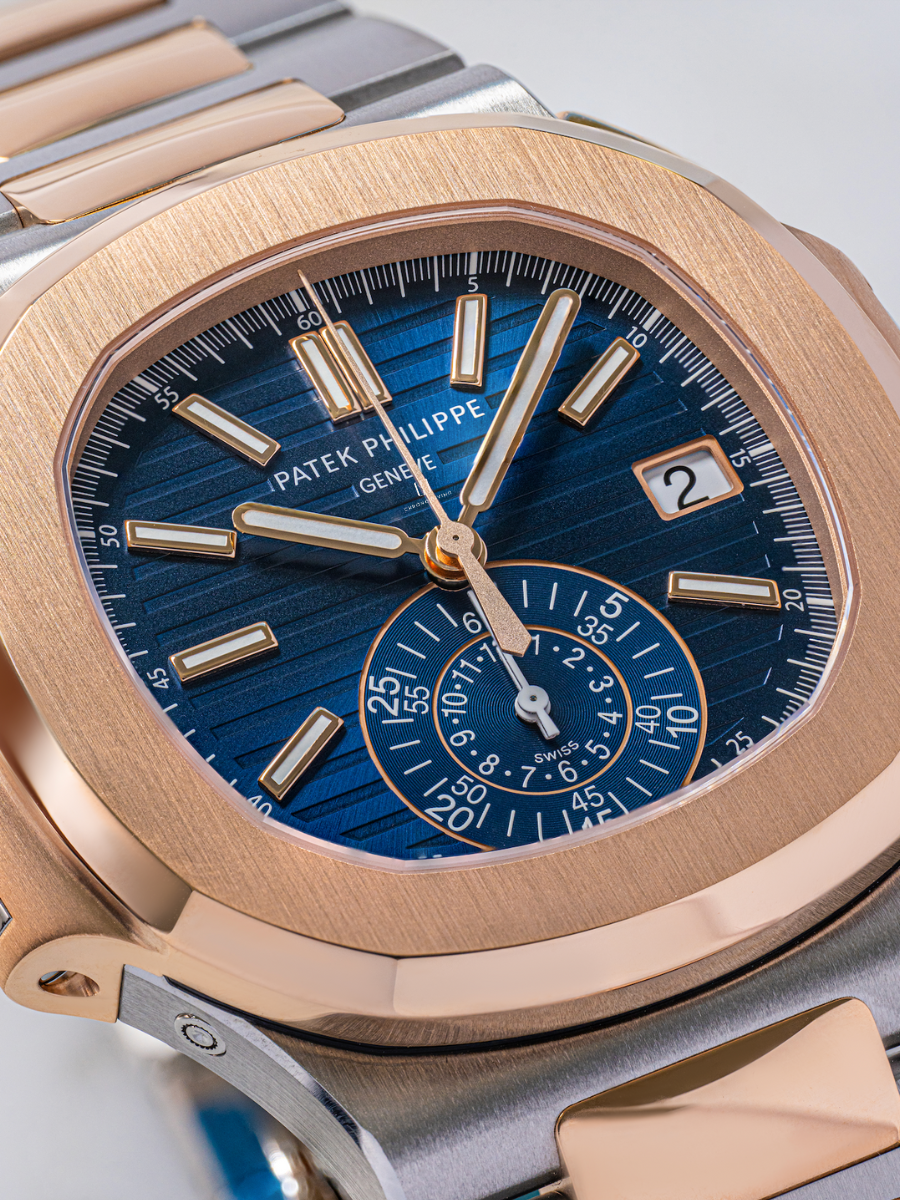 The blue dial of Patek Philippe 5980/1AR placed diagonally