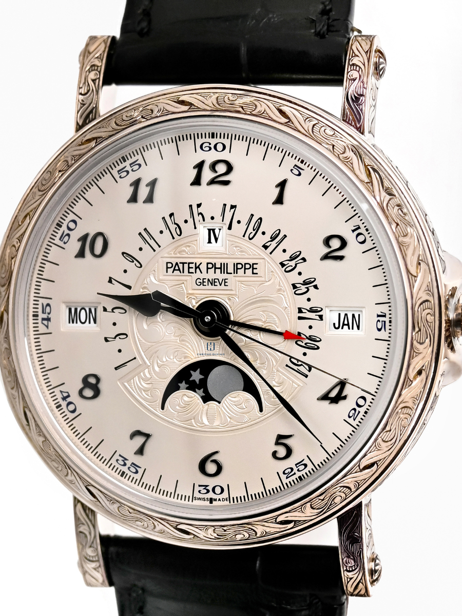 The image is the back portion of Patek Philippe 5160/500G, highlighting perpetual calendar with retrograde date hand