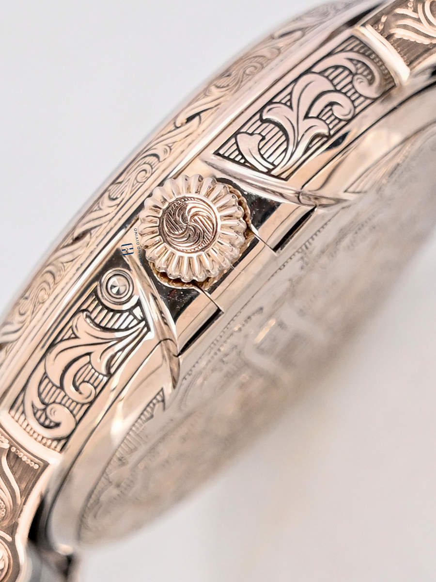 The image shows the hand-engraved fold-over clasp watch of Patek Philippe 5160/500G