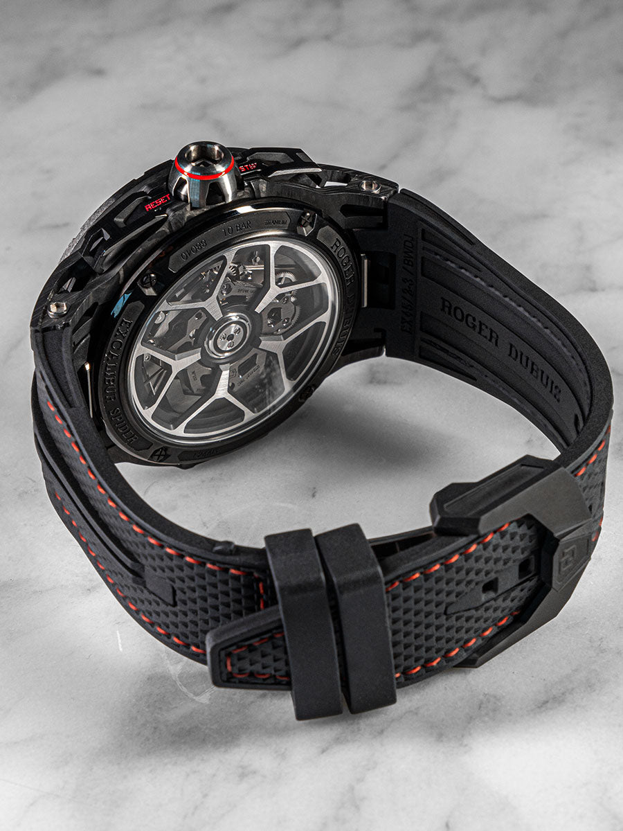 Close-up of Roger Dubuis Excalibur Spider Chronograph Flyback in lightweight titanium with visible movement and red chronograph pushers.