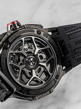 Bold and modern Roger Dubuis Excalibur Spider Flyback watch with technical skeleton dial and Flyback Chronograph movement, front-facing image.